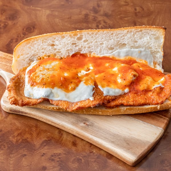 John's Deli chicken parmesan hero, with crispy chicken, melted mozzarella, and marinara sauce.